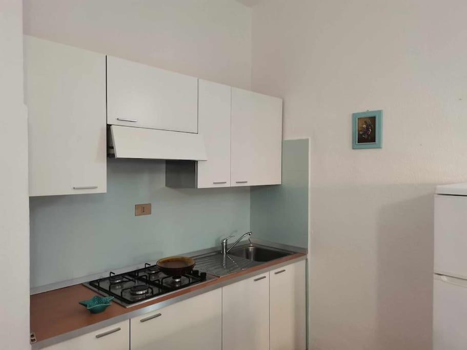 Casa Di Lu' - Bilocale Con Giardino - Porto Pollo Apartment Bagian luar foto